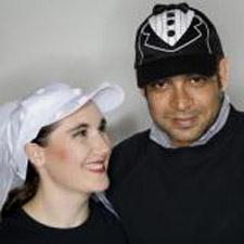A couple wearing baseball caps for marriage