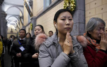 beijing catholics praying