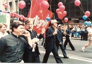 Priests march in the gay parade under the banner of dignity
