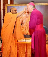 Archbishop Vincent Nichols being blessed by a Hindu