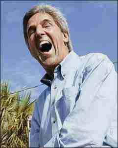 A photograph of Kerry opening his mouth widely while Campaigning