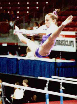 A young female Olympic performer engaged in highly immodest acrobatics