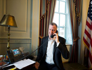 Mayor of New York Bill de Blasio on a phone