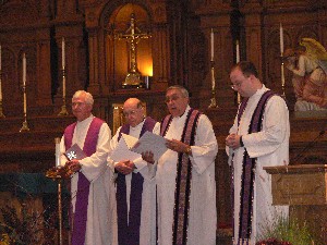 Four priests pronounce absolution for the whole Church