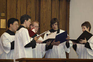 Young men singing Gregorian Chant