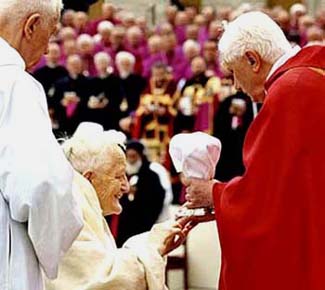 Card. Ratzinger gives communion in the hand to Protestant ROger Schutz