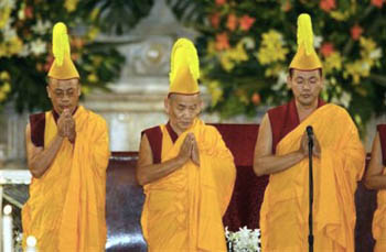 Buddhists pray inside the cathedral