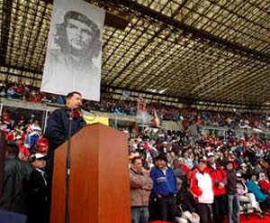 Chavez stands under a picture of Che Guevara and rails against the U.S.