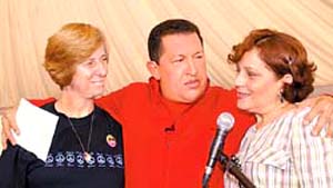 Elma Rosado and Cindy Sheehan with Chavez