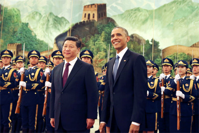 Obama smiling with the Chinese President