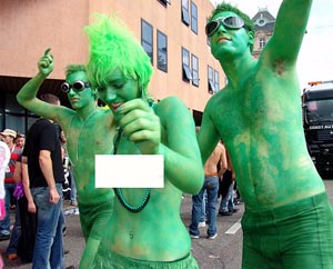 Green activists marching semi-nude