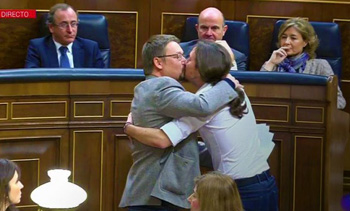 Pablo Iglesias kisses a man in the Parliament
