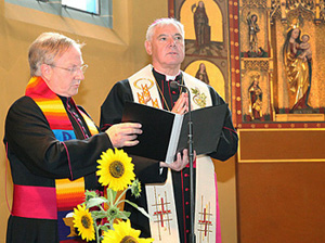 Archbishop Mueller prayer with Protestant