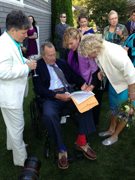 ex-president George W. Bush attending the wedding of two lesbians
