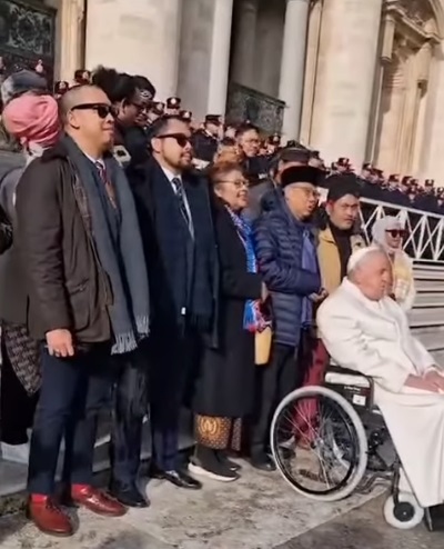 Francis listening to Muslim music