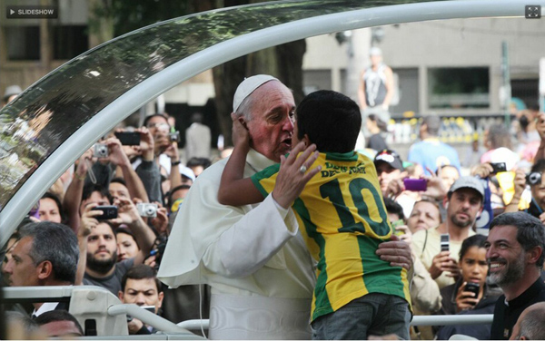 Pope Francis kisses boy on the mouth