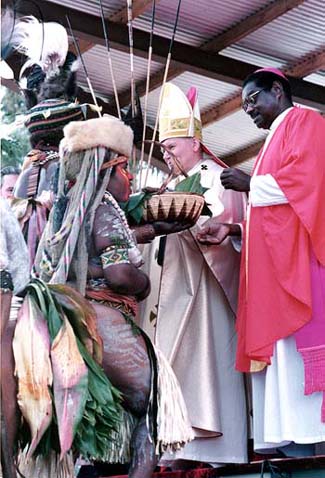 A nude woman brings the Offertory gifts to John Paul II