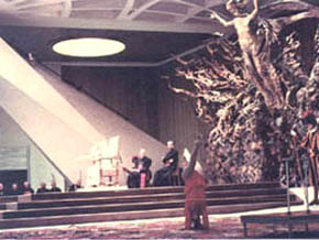 An acrobat performing before Pope John Paul II