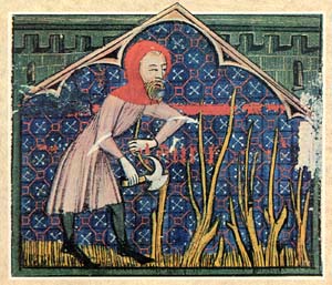 A medieval depiction of a charcoal burner cutting wood