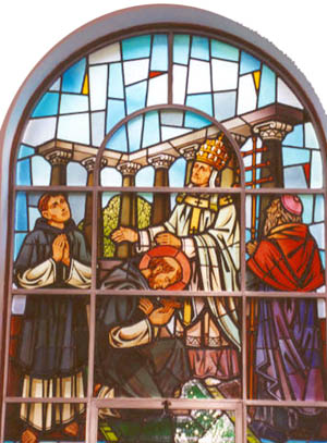 A stained glass window showing Pope Gregory II sending St. Boniface on his mission