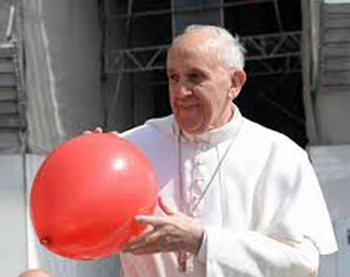 Pope Francis holding red balloon