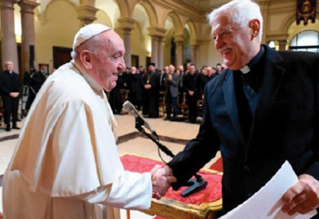 Masonic handshake with Arturo Sosa