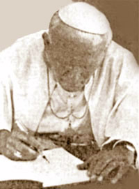 John Paul II signing Ut Unum Sint