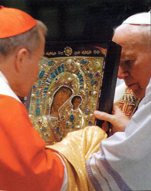 John Paul II gives the Icon to Card. Kasper for the hand over to schismatics