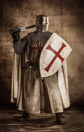 a knight templar in full uniform and armor