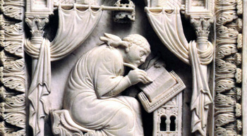 A stone carving of Gregory the great being inspired two write by a dove