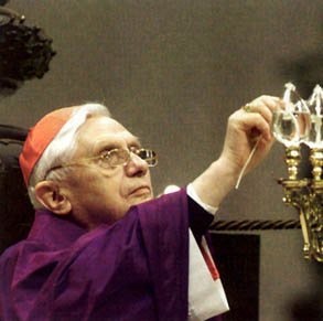 Cardinal Ratzinger lighting a lamp