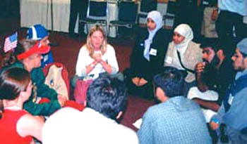 Americans sitting in a circle with muslims