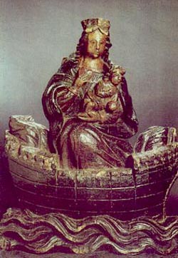 A little statue of the Virgin and Child in a boat